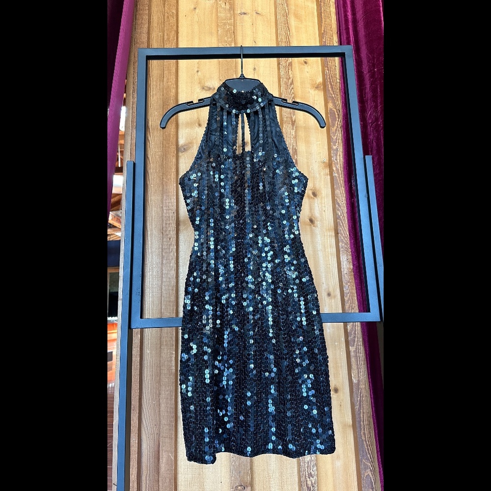 Lovely black sequined sleeveless cocktail mini dress